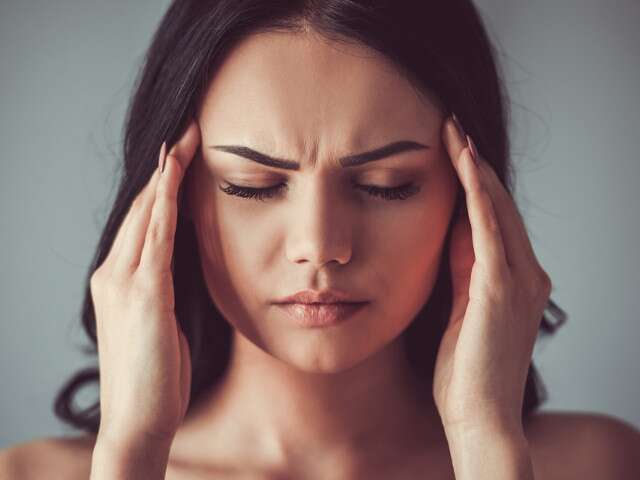 Someone experiencing a Migraine